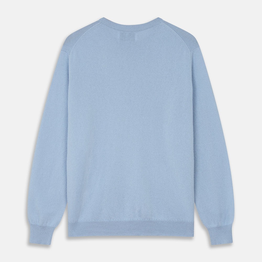 The Pale Blue Cashmere Glenn Jumper by Turnbull & Asser is laid flat against a white background. This men's crew neck essential features ribbed cuffs, hem, and neckline for timeless style.