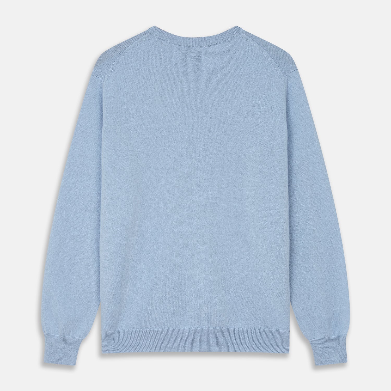 View 3 of product The Pale Blue Cashmere Glenn Jumper by Turnbull & Asser is laid flat against a white background. This men's crew neck essential features ribbed cuffs, hem, and neckline for timeless style.
