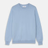 View 1 of product The Pale Blue Cashmere Glenn Jumper by Turnbull & Asser is laid flat against a white background. This men's crew neck essential features ribbed cuffs, hem, and neckline for timeless style.