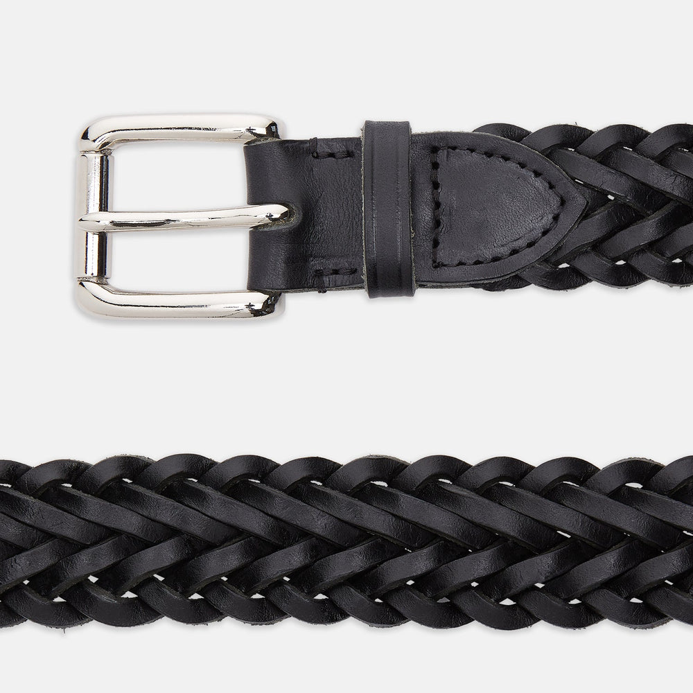 The Turnbull & Asser Black Leather Woven Belt, hand-woven with a shiny silver buckle, is shown rolled up on a plain white background.