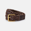View 1 of product The Turnbull & Asser Brown Leather Woven Belt features a chocolate brown braided design and a brass roller buckle, displayed on a plain white background.