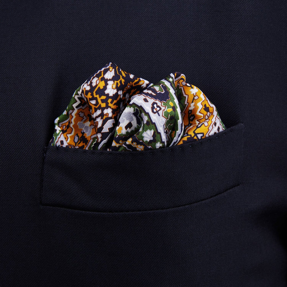 The Turnbull & Asser Lavender and Green Abstract Paisley Silk Pocket Square features a refined paisley design and is made in England.