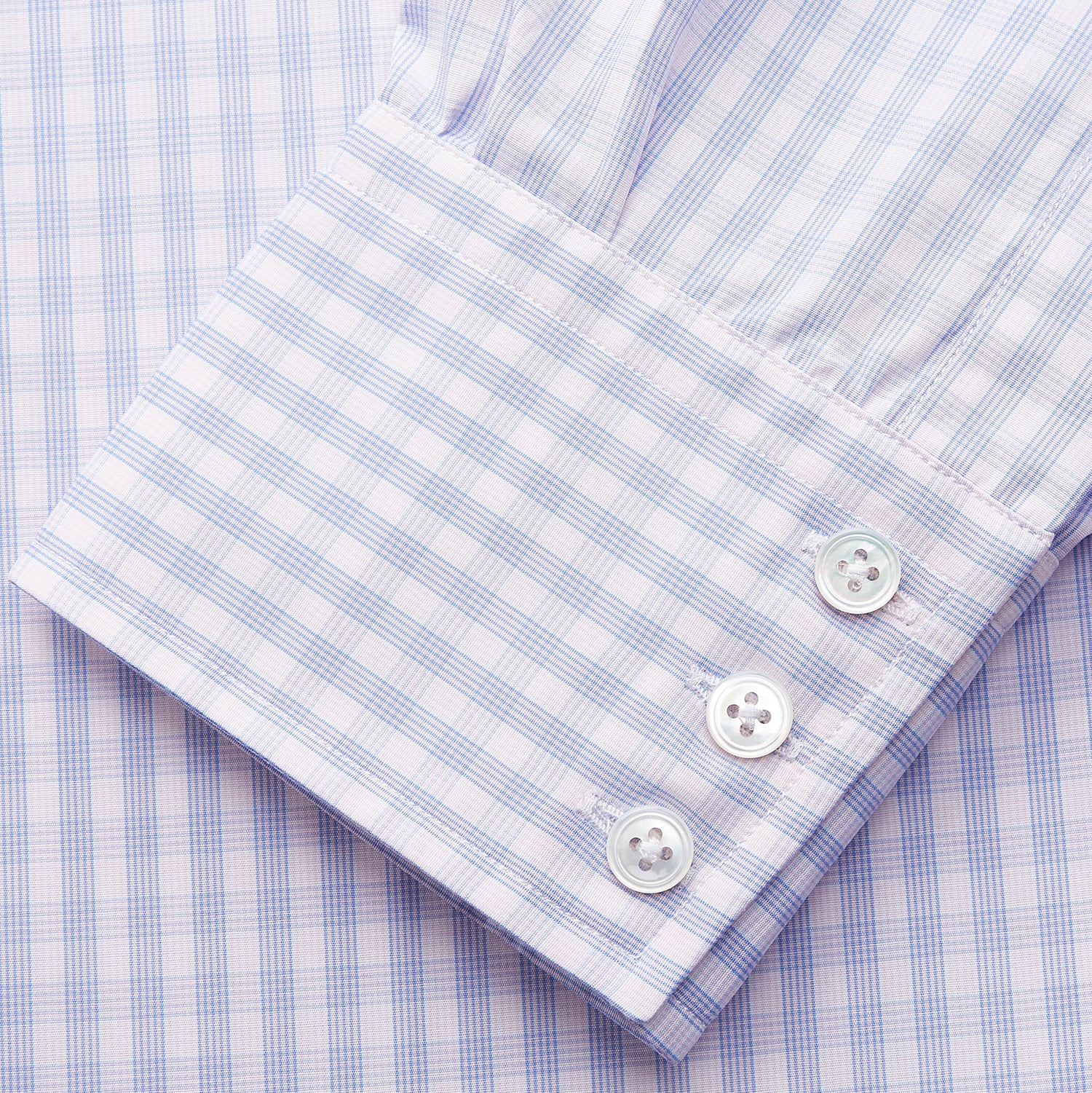 View 3 of product The Turnbull & Asser Lilac Multi Check Cotton Regular Fit Mayfair Shirt features a classic T&A collar and button-up design, shown laid flat in a light purple gingham pattern.