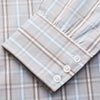 View 3 of product The Beige and Light Blue Check Cotton Regular Fit Mayfair Shirt by Turnbull & Asser features a classic plaid pattern, T&A collar, cuffed sleeves, and button-up front, shown laid flat on a white background.