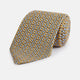 The Turnbull & Asser Yellow and Pale Blue Art Deco Silk Tie features interlocking yellow, blue, and black geometric shapes on white, adding a bold touch to any ensemble.