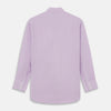 View 4 of product The Turnbull & Asser LILAC COTTON REGULAR FIT SHIRT is a long-sleeve, button-up cotton shirt with white buttons, a classic T&A collar, and cuffs, shown laid flat on a white background.