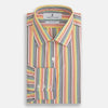 View 4 of product The MULTICOLOURED FELICIANO MAYFAIR SHIRT by Turnbull & Asser features vertical red, yellow, green, and blue stripes on white, a classic T&A collar, buttoned cuffs, and a rounded hem for timeless British style.