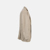 View 5 of product The Riviera Sand Oversized Blazer in Linen by Turnbull & Asser UK is showcased against a crisp white background. Featuring a relaxed, oversized silhouette in beige linen with two brown buttons, three front pockets, and a dark lining, this piece is perfect for effortless summer dressing.