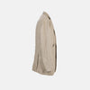 View 6 of product The Riviera Sand Oversized Blazer in Linen by Turnbull & Asser UK is showcased against a crisp white background. Featuring a relaxed, oversized silhouette in beige linen with two brown buttons, three front pockets, and a dark lining, this piece is perfect for effortless summer dressing.