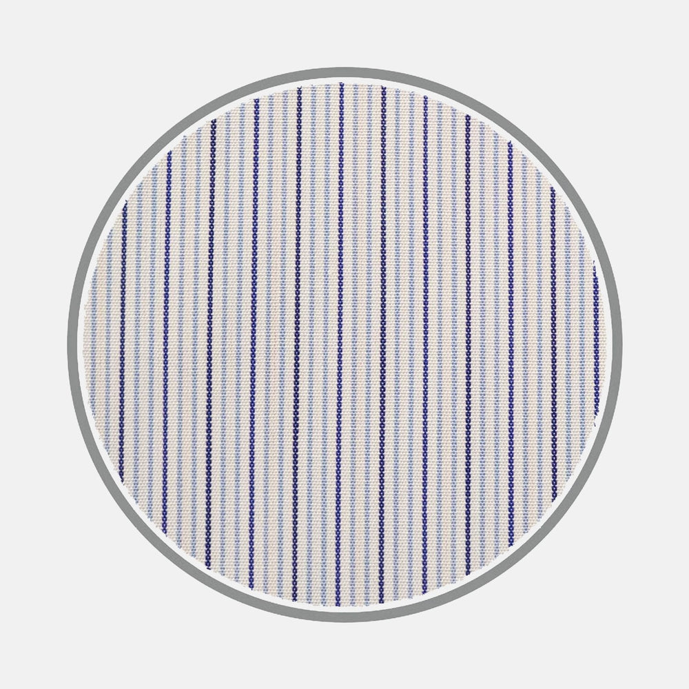 A circular swatch of Turnbull & Asser BESPOKE FABRIC 0069 32—white with thin vertical blue stripes, outlined in light gray—displayed on a plain white background; perfect for custom shirts.