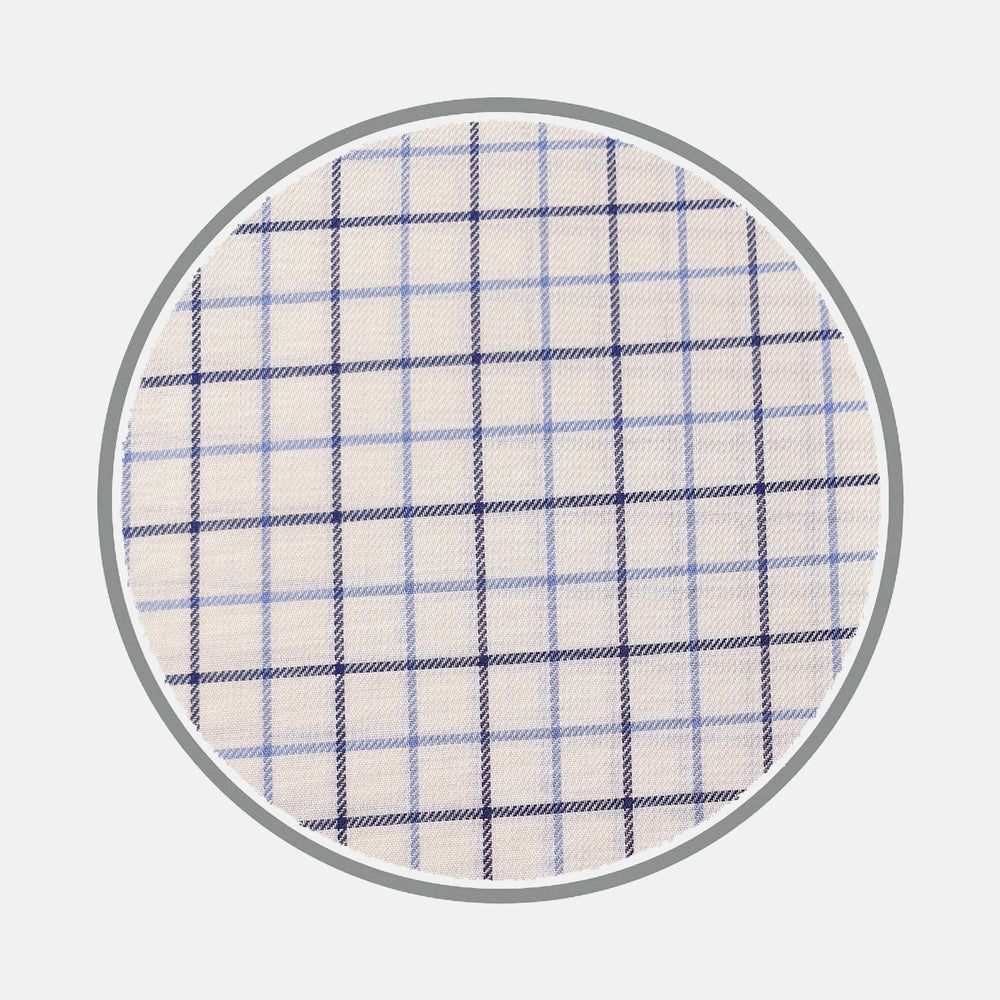 BESPOKE FABRIC 0091 32 by Turnbull & Asser features a round white fabric with a blue and navy checkered grid and a gray circular border, evoking classic bespoke shirt fabrics, set against a plain white background.