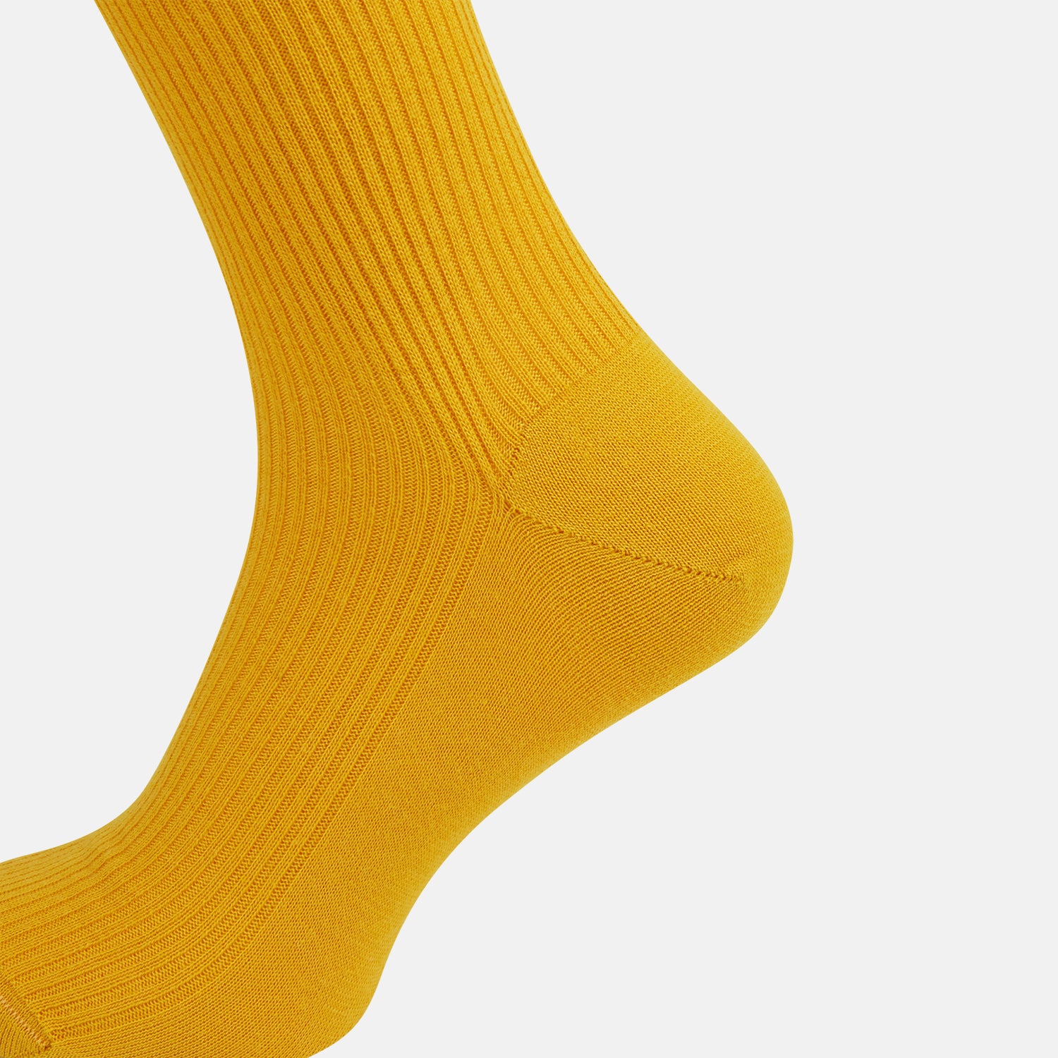 View 4 of product A single Yellow Mid-Length Merino Sock from Turnbull & Asser stands upright against a plain white background.