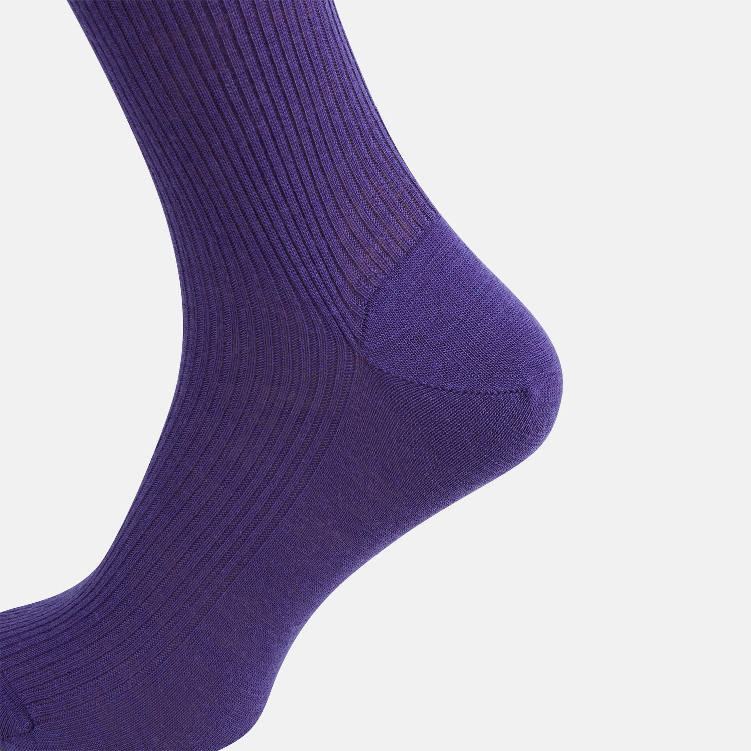 View 4 of product The Turnbull & Asser Violet Mid-Length Merino Socks, crafted from luxurious merino wool, feature a knee-high ribbed design and are shown upright against a plain white background.