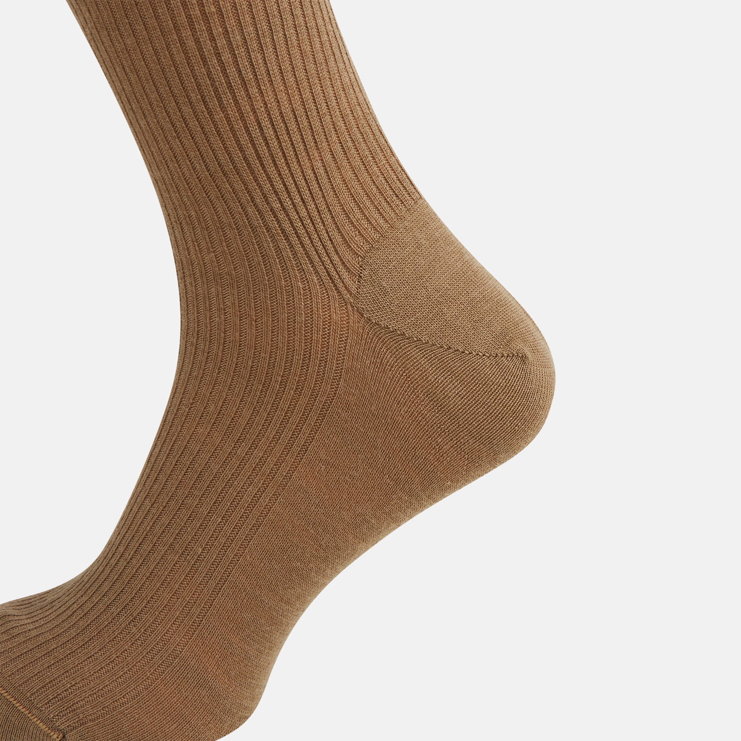 View 4 of product A single Turnbull & Asser Camel Mid-Length Merino Sock stands upright on a plain white background, showcasing its ribbed texture and reinforced toe and heel.