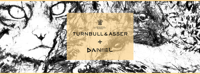 Black and white sketch of cats with a tan box in the center displaying the logos and text: Turnbull & Asser + Daniel and By appointment to HM King Charles III Shirtmakers.