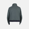 View 2 of product A Fairway Ash Grey Driving Jacket in Cotton by Turnbull & Asser UK, featuring a zip-up front, high collar, chest and side zip pockets, and dark ribbed cuffs and waistband; crafted from lightweight cotton for comfort and style, displayed on a plain white background.