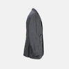 View 6 of product The Riviera Ash Oversized Blazer in Linen by Turnbull & Asser UK, showcased against a plain white background, features a single-breasted design in dark gray linen—ideal for summer tailoring—with two front buttons and large flap pockets. This jacket seamlessly combines classic style with breathable comfort.