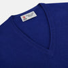 View 2 of product The Royal Blue long-sleeve V-neck jumper in cashmere from Turnbull & Asser UK is displayed against a white background.