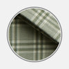 View 1 of product Close-up of BESPOKE FABRIC 1173 08 by Turnbull & Asser—a green and white plaid with intersecting lines in a checkered pattern, shown in a circular frame on a light gray background. Ideal for crafting your next custom shirt.