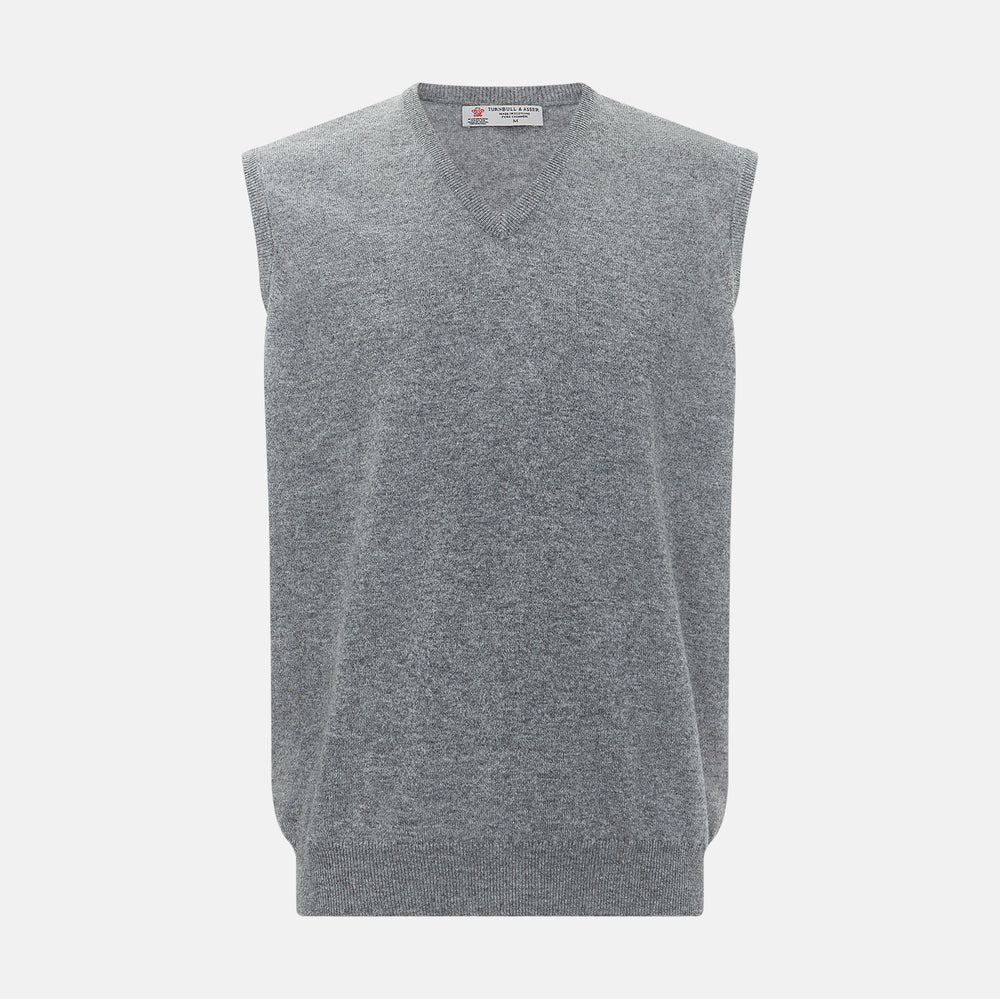 Turnbull & Asser UK’s marl grey sleeveless V-neck vest in cashmere, featuring a ribbed hem and crafted from soft knit fabric, is showcased against a plain white background.