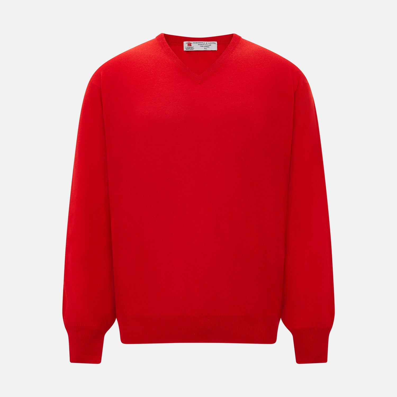 View 1 of product The Turnbull & Asser UK Red long-sleeve V-neck jumper in cashmere features ribbed cuffs and hem, and is shown on a white background.