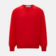 The Turnbull & Asser UK Red long-sleeve V-neck jumper in cashmere features ribbed cuffs and hem, and is shown on a white background.