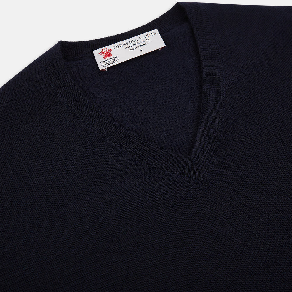 The Turnbull & Asser UK Black long-sleeve V-neck jumper in cashmere is displayed against a white background.