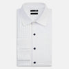 View 5 of product Turnbull & Asser UK Casino Royale White Dress Shirt in Cotton featuring a white cotton poplin design with a pleated bib front and dark buttons.