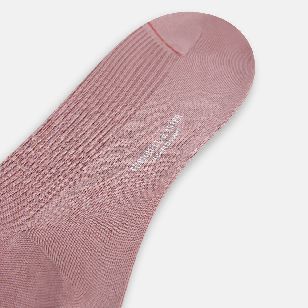 A single Rose Mid-Length Merino Sock by Turnbull & Asser is shown upright on a plain white background, highlighting its ribbed texture and fitted toe and heel.