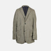 View 1 of product The Riviera Olive Oversized Blazer in Linen by Turnbull & Asser UK is a warm-weather-inspired blazer in an olive hue, featuring a relaxed fit, notched lapels, three front pockets, and two buttons, showcased against a plain white background.