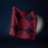 View 3 of product The DR. NO Red and Black Multi Spots Silk Pocket Square by Turnbull & Asser is handmade in England, featuring large red circles on black, with "Turnbull & Asser" and "Made in England" printed in white in the corners.