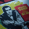 View 2 of product Vintage French James Bond 007 Dr. No poster featuring Sean Connery inspires the Turnbull & Asser DR. NO Yellow and Blue Poster Silk Pocket Square—handmade in England with bold illustrated colors.