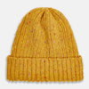 View 1 of product The Turnbull & Asser Yellow Donegal Ribbed Merino Hat features a mustard hue, folded brim, and subtle multicolored flecks in the yarn. Shown on a white background.
