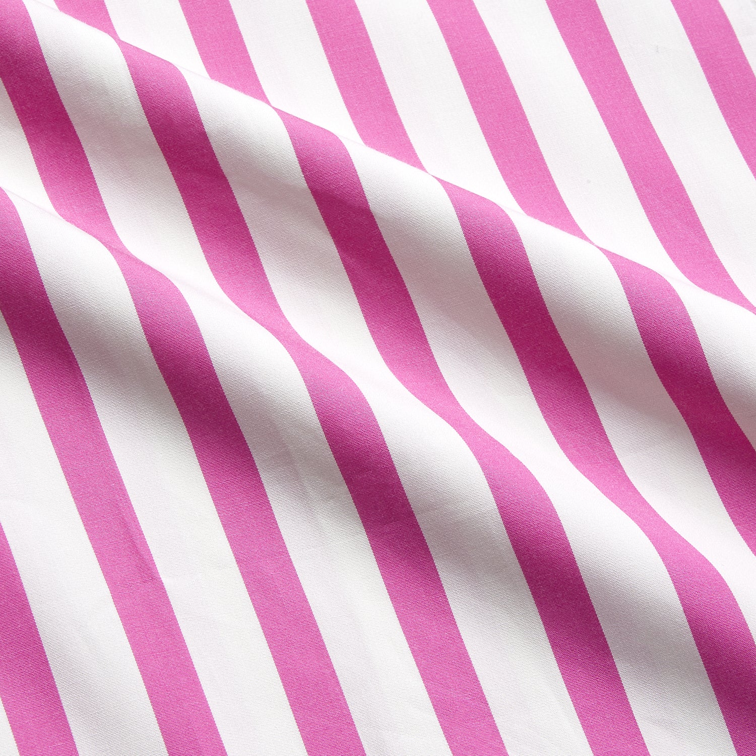 View 6 of product The Turnbull & Asser Pink Candy Stripe Cotton Traditional Pyjamas feature long sleeves, pants, vertical pink candy stripes, a camp collar shirt with buttons, chest pocket, and navy trim on the pocket and cuffs.