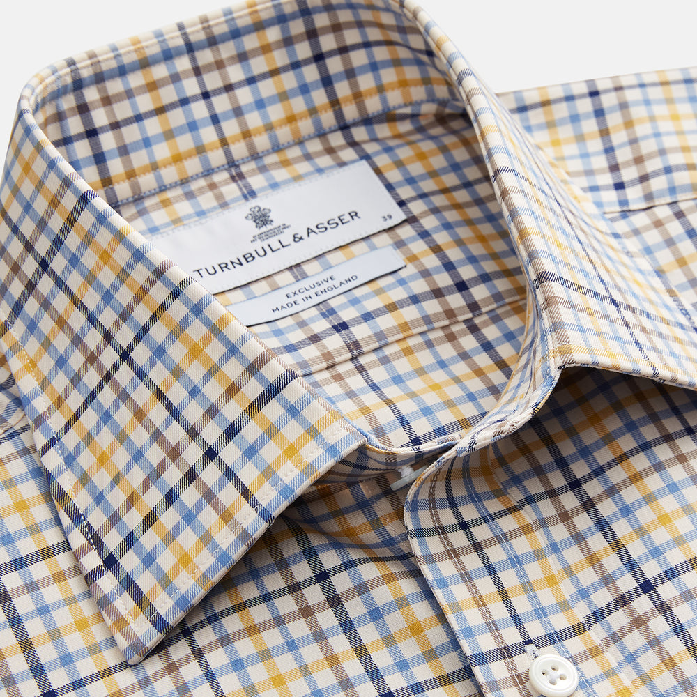 The Yellow Multi Check Regular Fit Shirt by Turnbull & Asser features a T&A collar and 3 button cuffs, showcased flat on a white background.