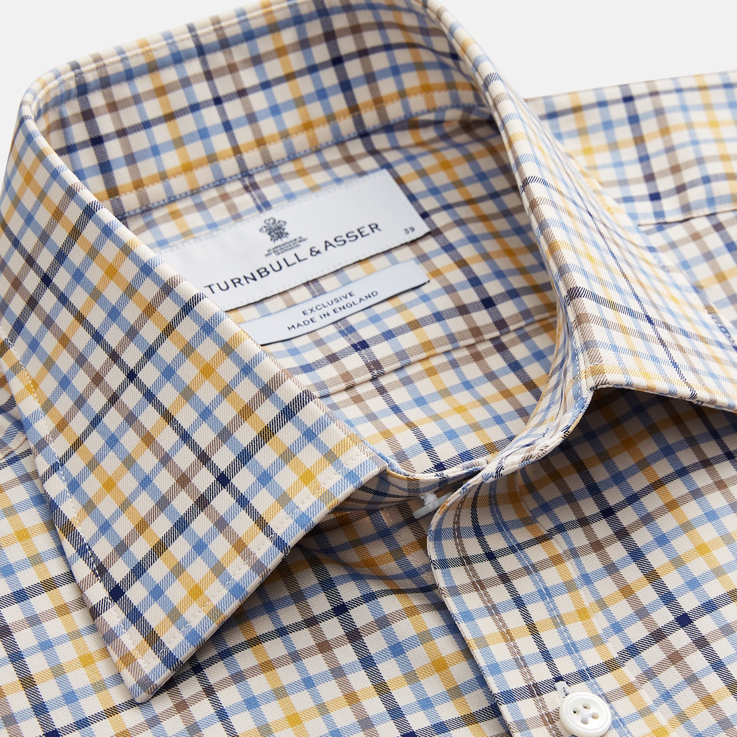 View 2 of product The Yellow Multi Check Regular Fit Shirt by Turnbull & Asser features a T&A collar and 3 button cuffs, showcased flat on a white background.