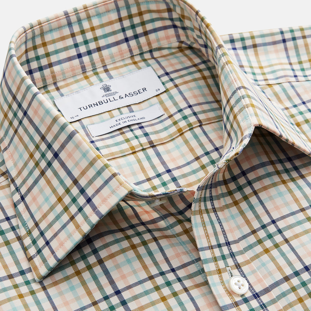 The Turnbull & Asser Green Multi Check Regular Fit Shirt features a T&A collar, 3 button cuffs, and a vibrant yellow, blue, and green check pattern on white. Inspired by Harriet Smith.