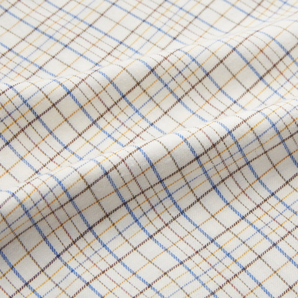 The Turnbull & Asser Brown Multi Check Regular Fit Cotton-Cashmere Shirt features a white base with blue, yellow, and brown checks, T&A collar, and 3 button cuffs for a smart-casual look.