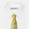 View 4 of product The Turnbull & Asser Yellow Graphic Deco Silk Tie features a subtle pattern of light blue geometric shapes and small black dots, elegantly rolled against a white background.