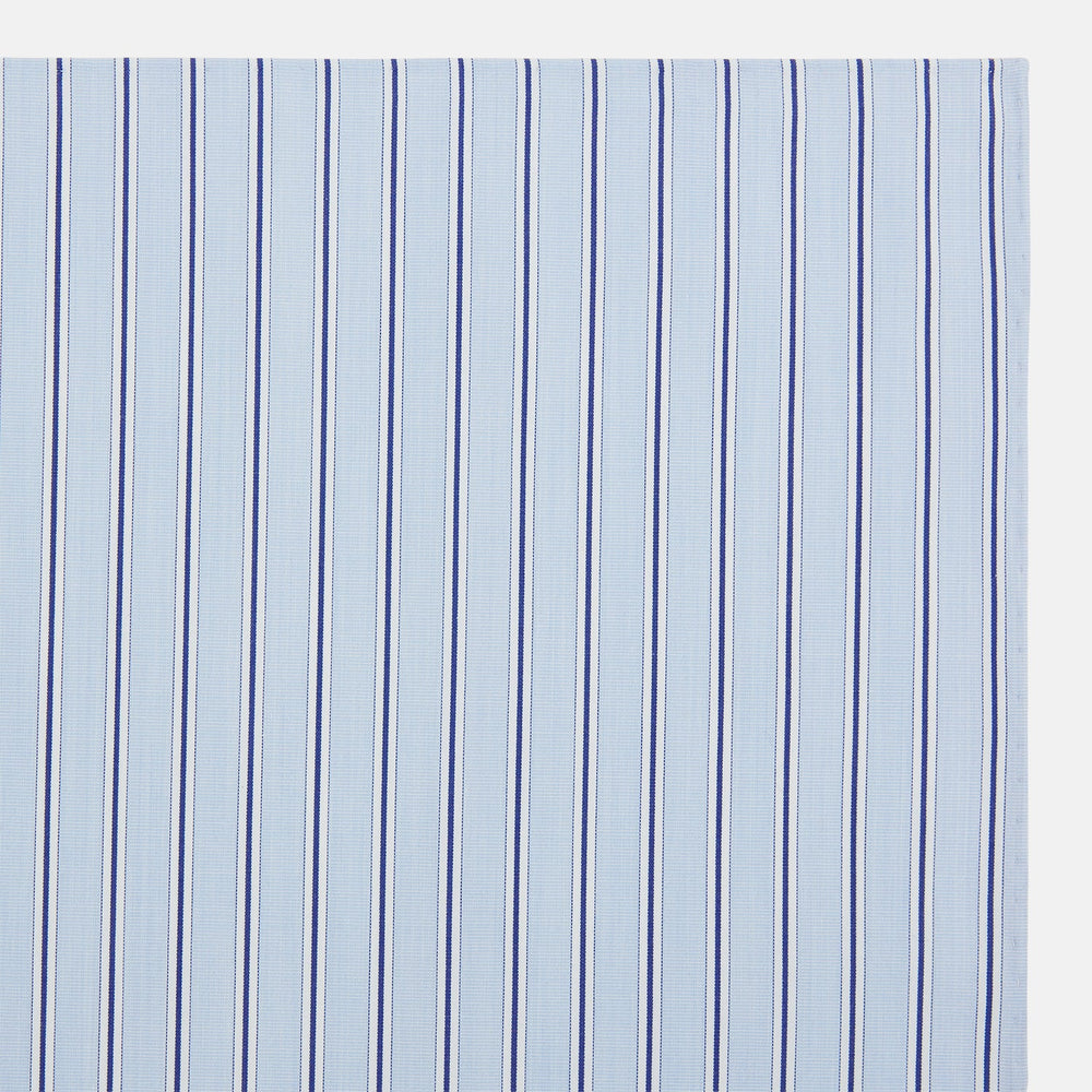 The Turnbull & Asser Hand Rolled Blue Multi Stripe Handkerchief features evenly spaced thin navy stripes—a stylish formal accessory for any occasion.