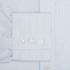 View 3 of product The Turnbull & Asser Blue and White Pencil Stripe Cashmerello Mayfair Shirt features a pointed collar, white buttons, buttoned cuffs, and long sleeves. Crafted from a cotton-cashmere blend, it’s displayed flat on a white background.