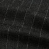 View 6 of product The Charcoal Pinstripe Henry Trousers by Turnbull & Asser feature white vertical stripes, a button and zip closure, belt loops, and side pockets, shown against a plain white background.