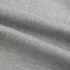 View 6 of product The Turnbull & Asser Grey Herringbone Chelsea Shirt features long sleeves, a chest pocket, classic collar, and buttoned cuffs, adding refined style to smart-casual outfits—shown here against a plain white background.
