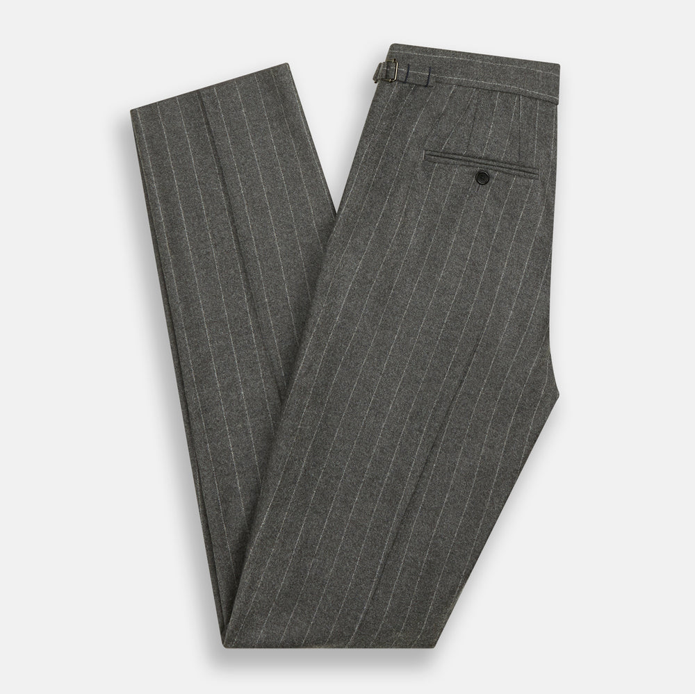 The Turnbull & Asser Grey Pinstripe Henry Trousers feature a tailored fit, white vertical stripes, button closure, and belt loops, displayed on a plain white background.