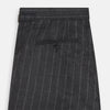 View 4 of product The Charcoal Pinstripe Henry Trousers by Turnbull & Asser feature white vertical stripes, a button and zip closure, belt loops, and side pockets, shown against a plain white background.