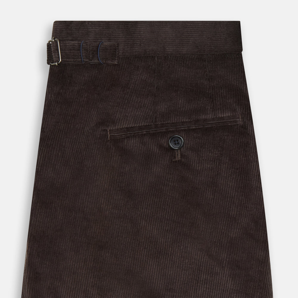 The Brown Corduroy Henry Trousers by Turnbull & Asser feature a slim, tailored fit with side adjusters and button closure, shown on a plain white background.