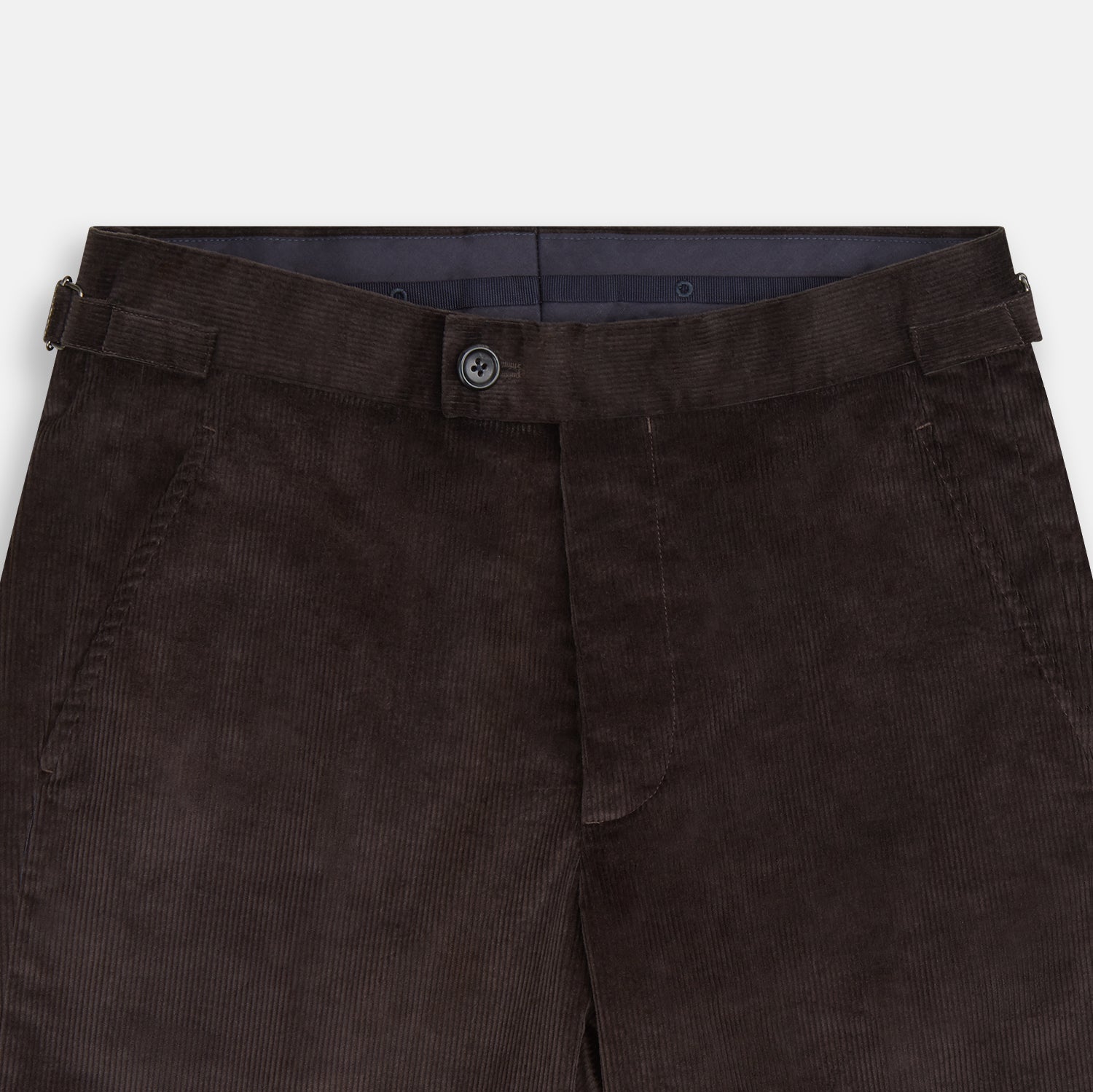 View 2 of product The Brown Corduroy Henry Trousers by Turnbull & Asser feature a slim, tailored fit with side adjusters and button closure, shown on a plain white background.