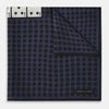 View 3 of product The Casino Royale Midnight Blue Straight Flush Pocket Square in Silk by Turnbull & Asser UK features a rich midnight blue background adorned with a black dotted pattern and showcases five playing cards—the 10, 9, 8, 7, and 6 of spades—arranged in a row at the center for an elegant straight flush design inspired by classic casino style.