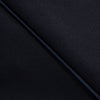 View 8 of product The Casino Royale Midnight Blue Tuxedo Trousers in Wool by Turnbull & Asser UK are shown from the back, expertly crafted from virgin wool in a signature tuxedo style, featuring two buttoned back pockets and adjustable side tabs at the waistband.