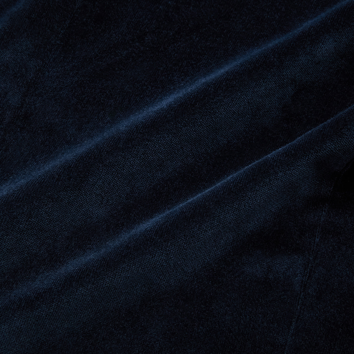 View 5 of product Turnbull & Asser UK’s Casino Royale Midnight Blue Tuxedo Jacket in Cotton Velvet, featuring a single button closure and a luxurious silk-satin shawl lapel, is showcased against a plain white background.